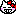 にやっ